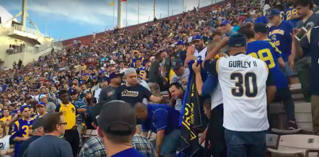 (VIDEO): Rams Fan Gets Pushed Down Multiple Rows By Another Fan