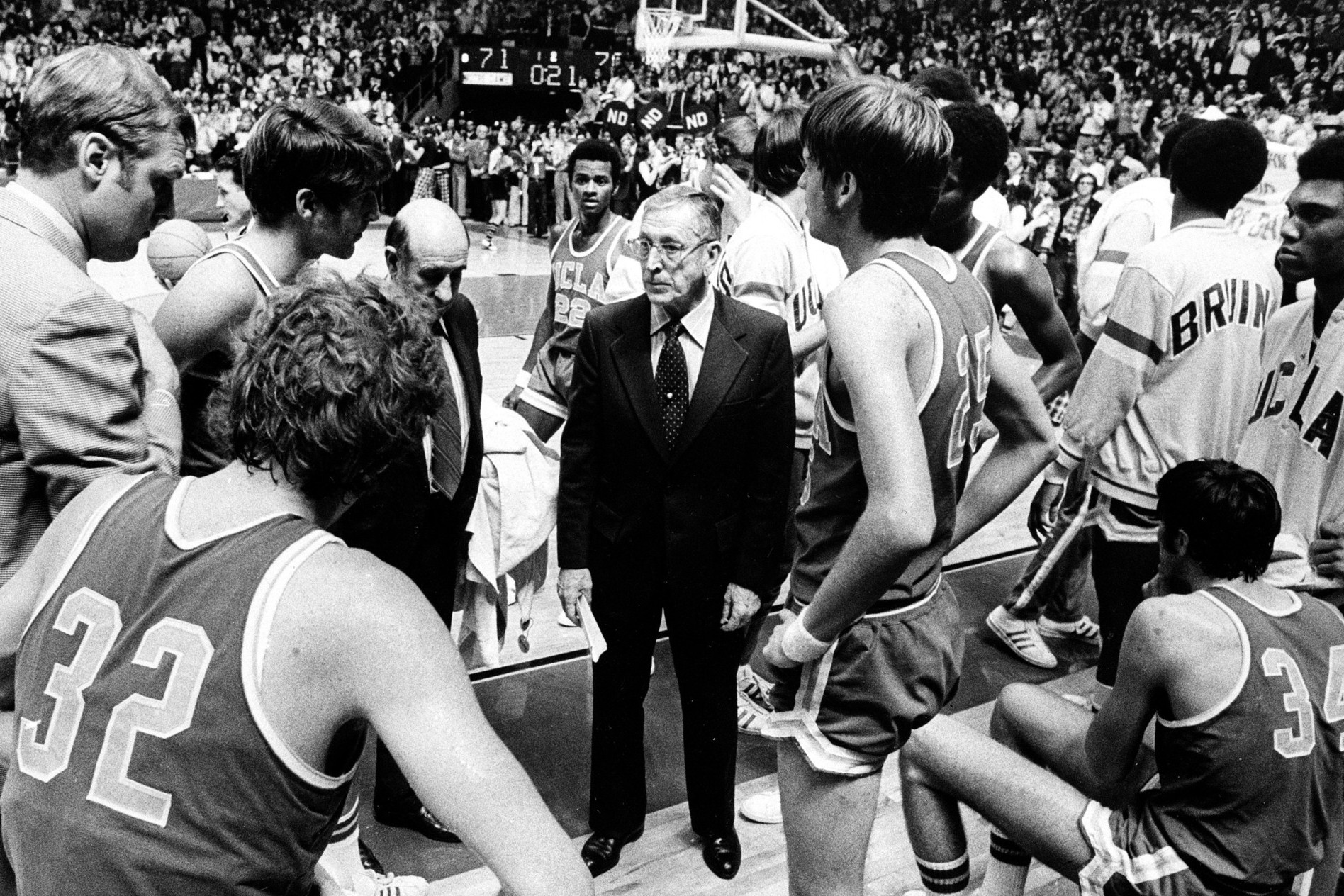 Geno's Huskies vs. Wooden's Bruins: Who is More Dominant?