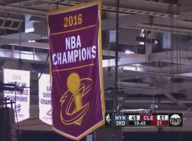 Cleveland Cavaliers raised championship banner in season opener.