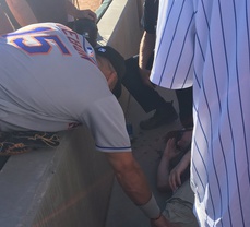 Tebow prays over man during Baseball Game