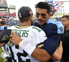 Mariota develops all-around game, Titans finally play loose