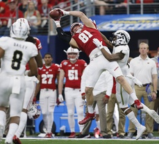 Badgers claw out a Cotton Bowl victory over Broncos