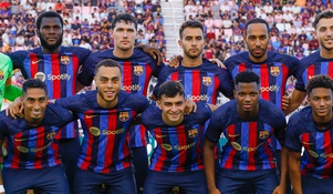 How is FC Barcelona buying players while $1 billion in debt?