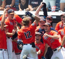 WATCH: Virginia catcher marks CWS debut with homerun while his dad watches from the stands!