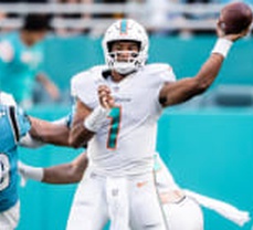 Tua leads Dolphins over Panthers 33-10