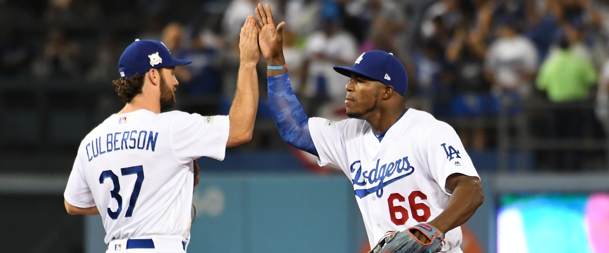 Dodgers win Game 1 backed by bullpen and Yasiel Puig  