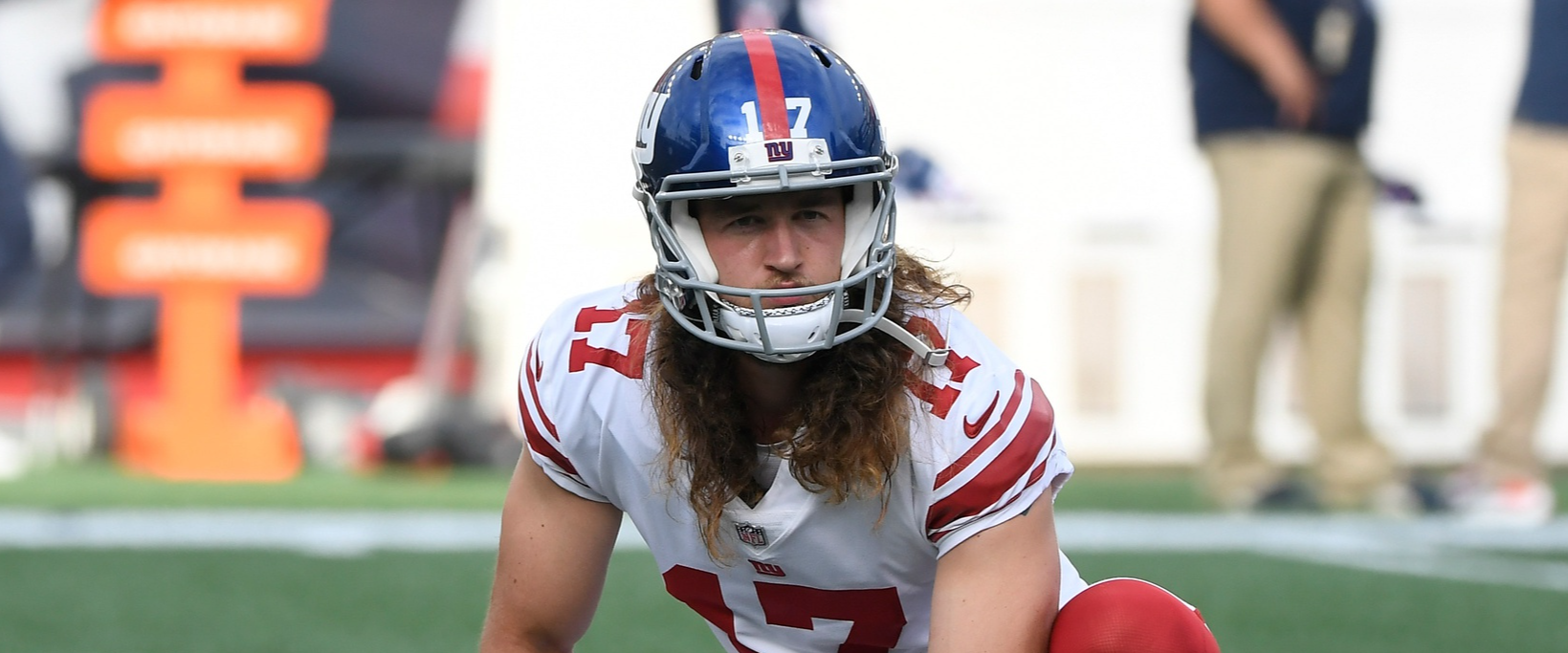 Giants punter remains in London amid passport issues